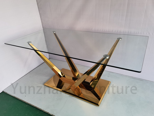 Mesa de jantar retangular com vidro transparente e base simples