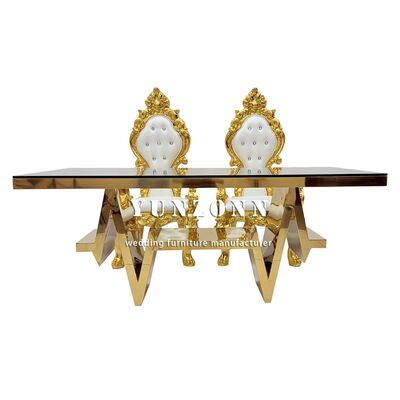 Bom preço Atacadista Mesa de Casamento Móveis Mesa Moderna de Luxo em Aço Inoxidável Dourado com Tampo de Vidro Conjunto de 6 Cadeiras on-line
