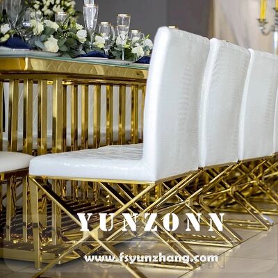 Bom preço Cadeira de jantar de couro em PU branco de luxo moderno com pernas de metal design de costura cruzada para estilo de lazer em casa ou hotel on-line