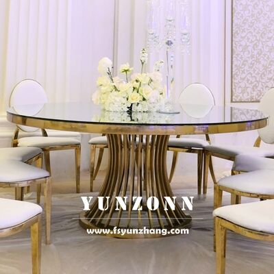 Bom preço Mesa de Jantar Redonda de Luxo com Base de Aço Inoxidável Dourado e Tampo de Vidro para Mobiliário de Hotel para Banquetes de Casamentos e Eventos on-line