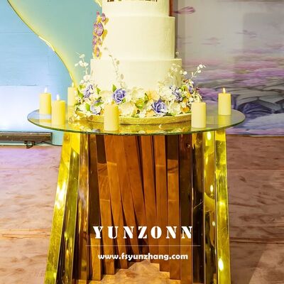 Bom preço Tabela de bolo de vidro branco com base de ninho de ouro redondo de aço inoxidável para móveis de hotel on-line